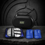 Black Warrior Makers peptide travel case with digital thermometer, open storage pocket and two blue ice packs on a stone surface